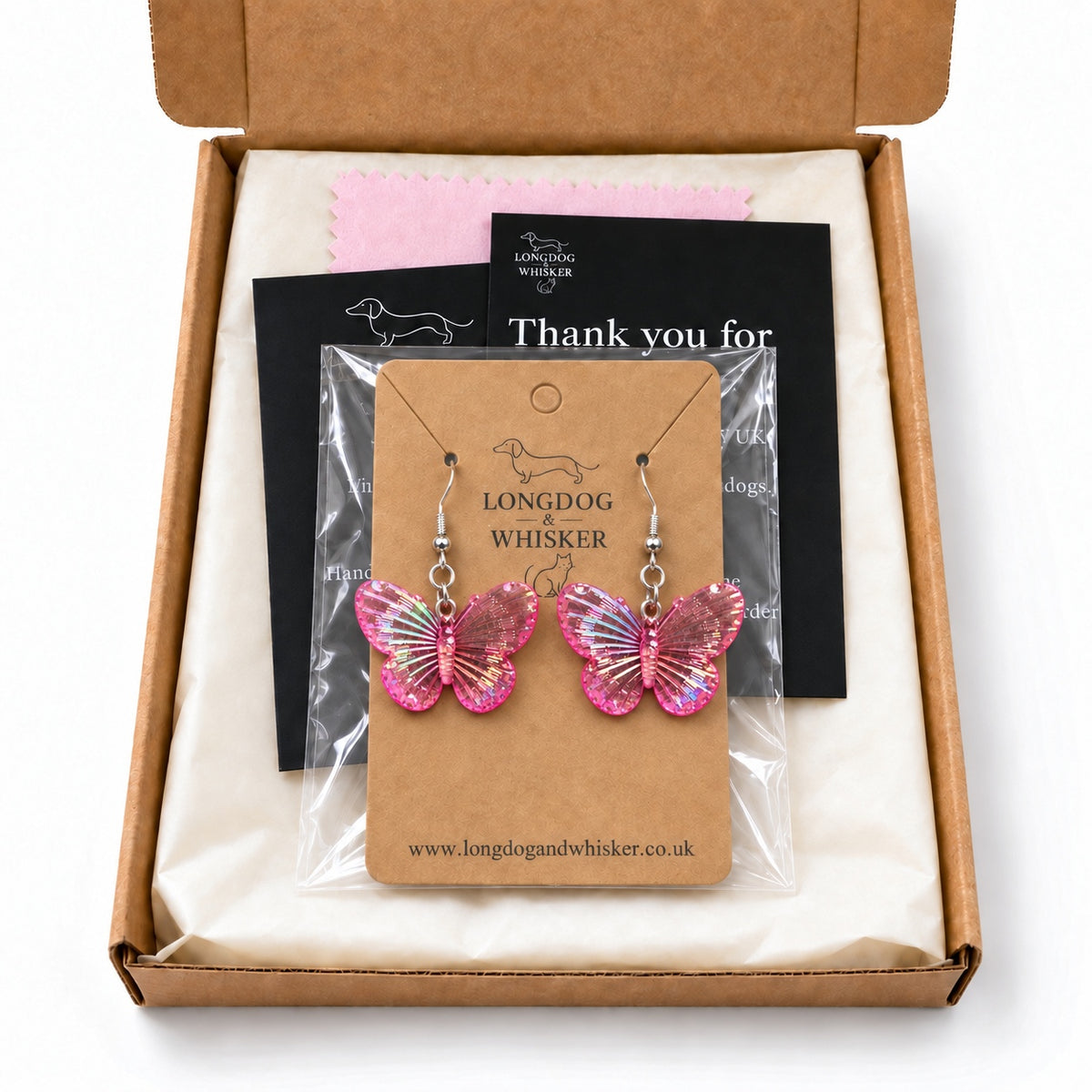 Hot Pink Aurora Butterfly Earrings in Longdog & Whisker packaging