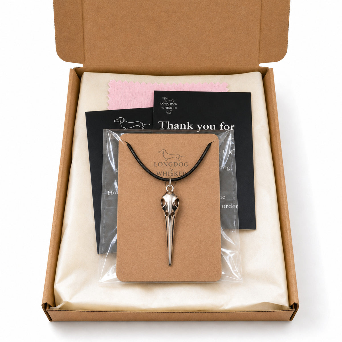 Classic Bird Skull Necklace with Longdog & Whisker packaging