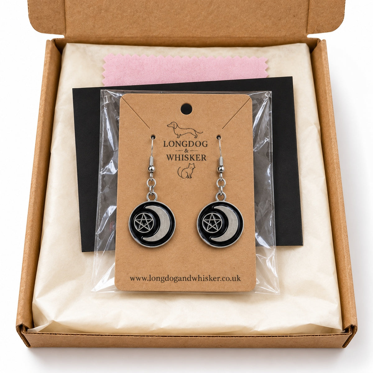 Black crescent moon and pentagram drop earrings in Longdog & Whisker gift-ready packaging