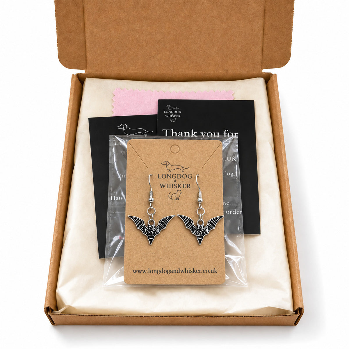 Black bat earrings on their card in Longdog & Whisker gift packaging