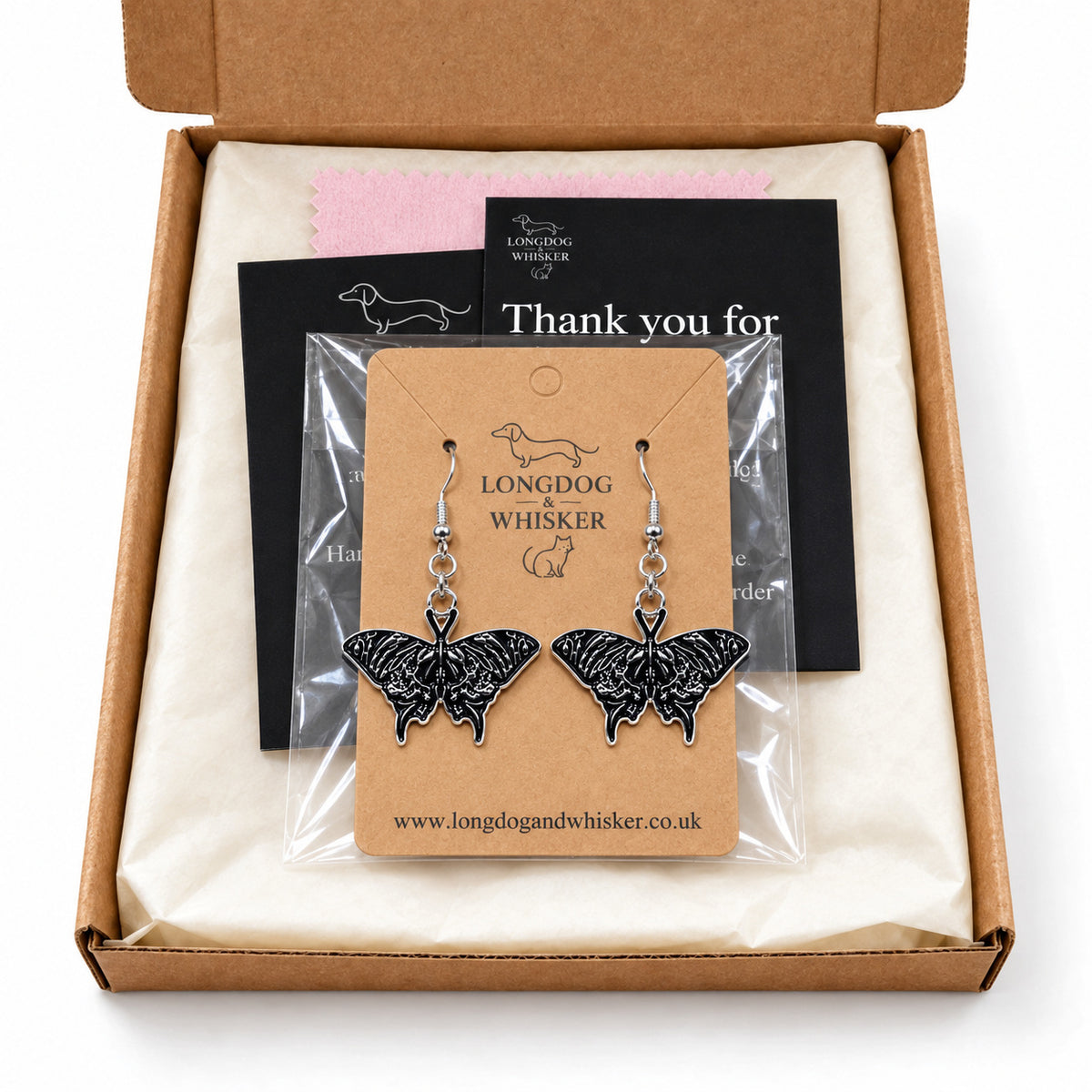 Black Skullwing Moth Drop Earrings in gift-ready packaging