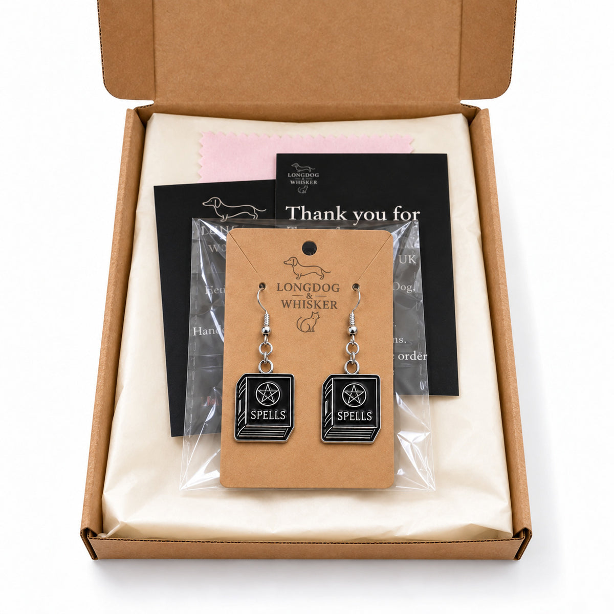 Black spellbook drop earrings in Longdog & Whisker gift packaging