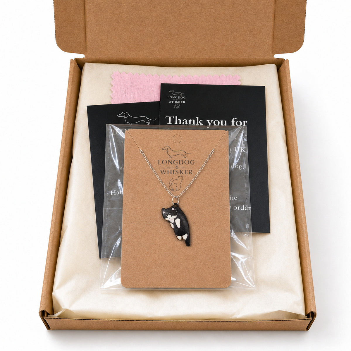 Scruffles Cat Necklace - Black & White with Longdog & Whisker packaging