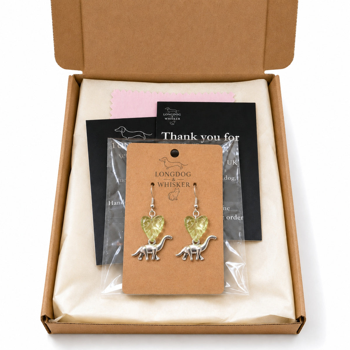 Brontosaurus Earrings with Longdog & Whisker packaging