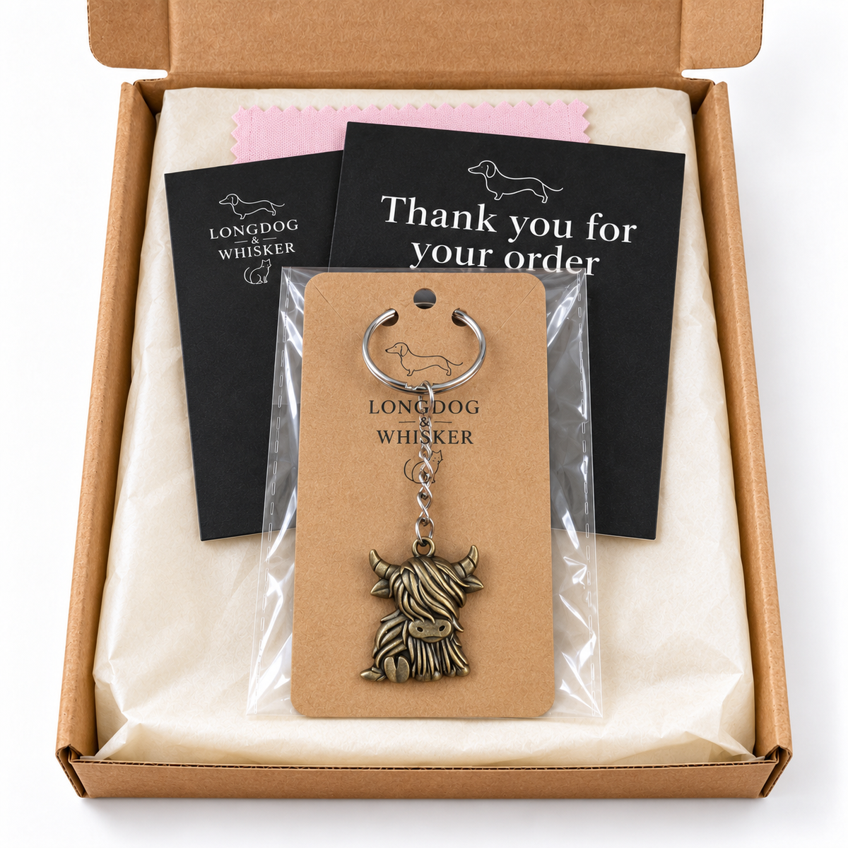 Bronze Highland Cow Keyring and Bag Charm in Longdog & Whisker gift packaging