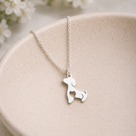 Cat At Heart Dog Necklace - Silver displayed in a lifestyle product photo