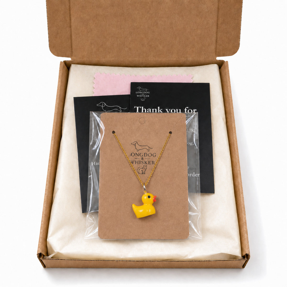 Rubber Duck Necklace with gold chain in Longdog & Whisker packaging