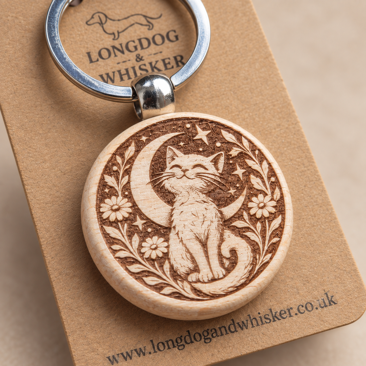 Close detail of the Moonlit Cat wooden keyring engraving