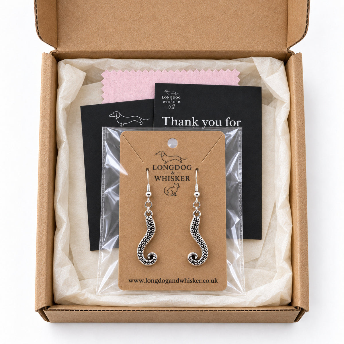 Octopus tentacle drop earrings presented in Longdog & Whisker gift packaging