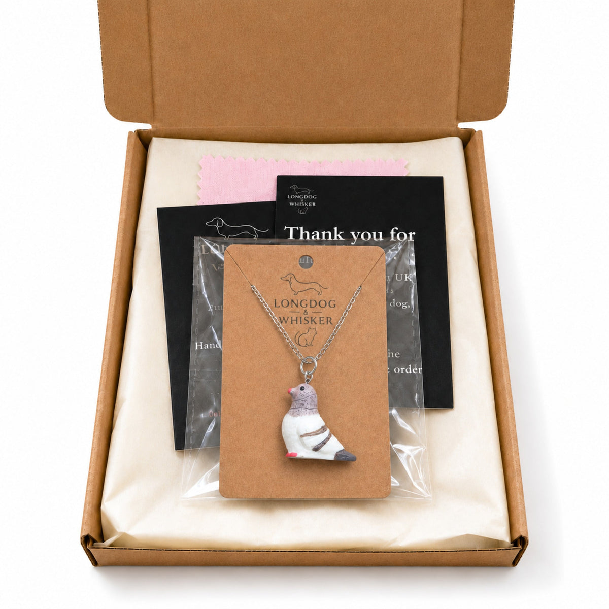 Pigeon Necklace in Longdog & Whisker gift-ready packaging