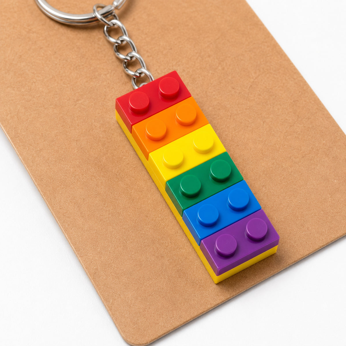 Close-up detail of Pride Brick Keyring - Red to Purple