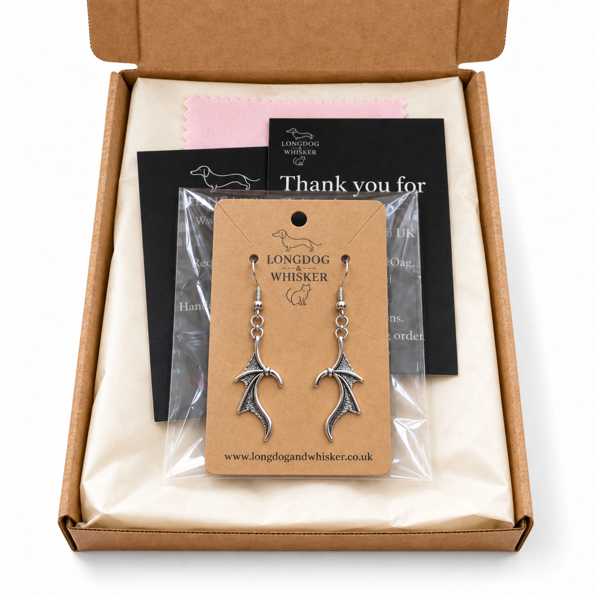Silver Dragon Wing Drop Earrings in Longdog & Whisker packaging