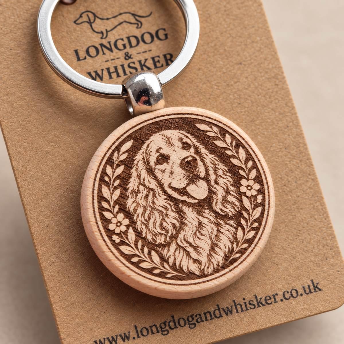 Close-up of the printed Springer Spaniel wooden keyring and silver-tone hardware