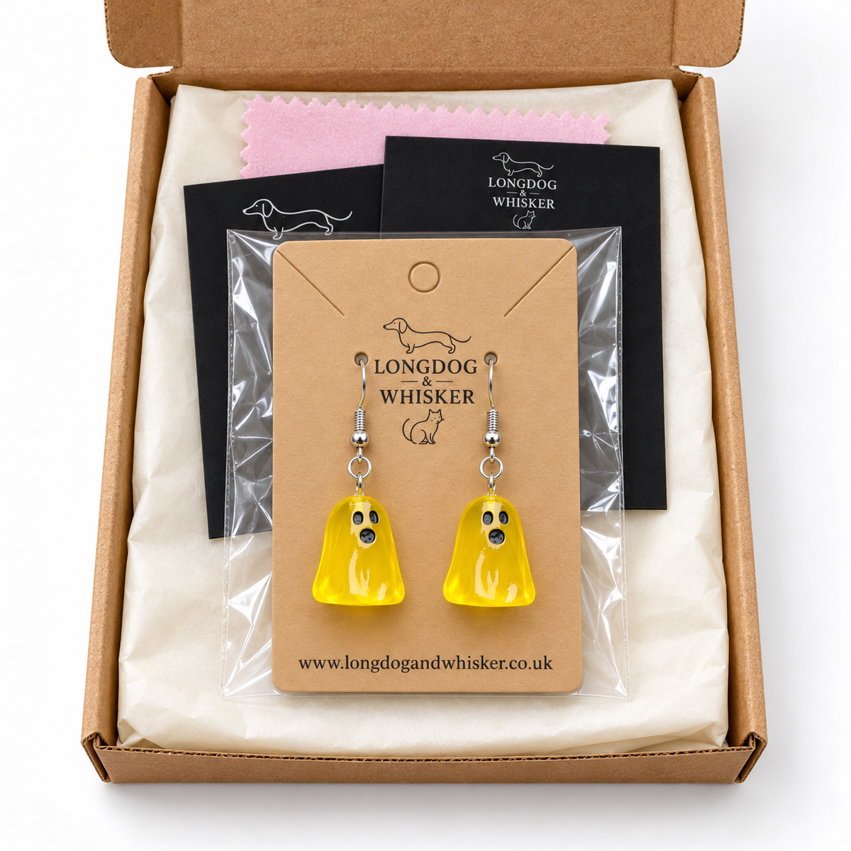Translucent yellow ghost earrings in Longdog & Whisker gift packaging