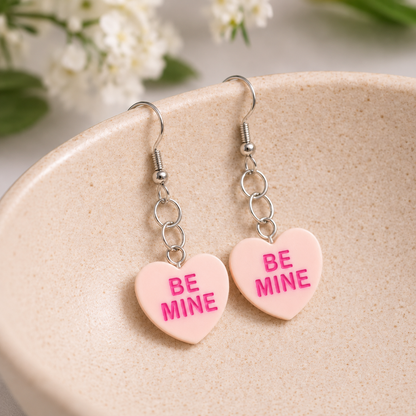 Be Mine Heart Earrings - Peach displayed in a lifestyle product photo