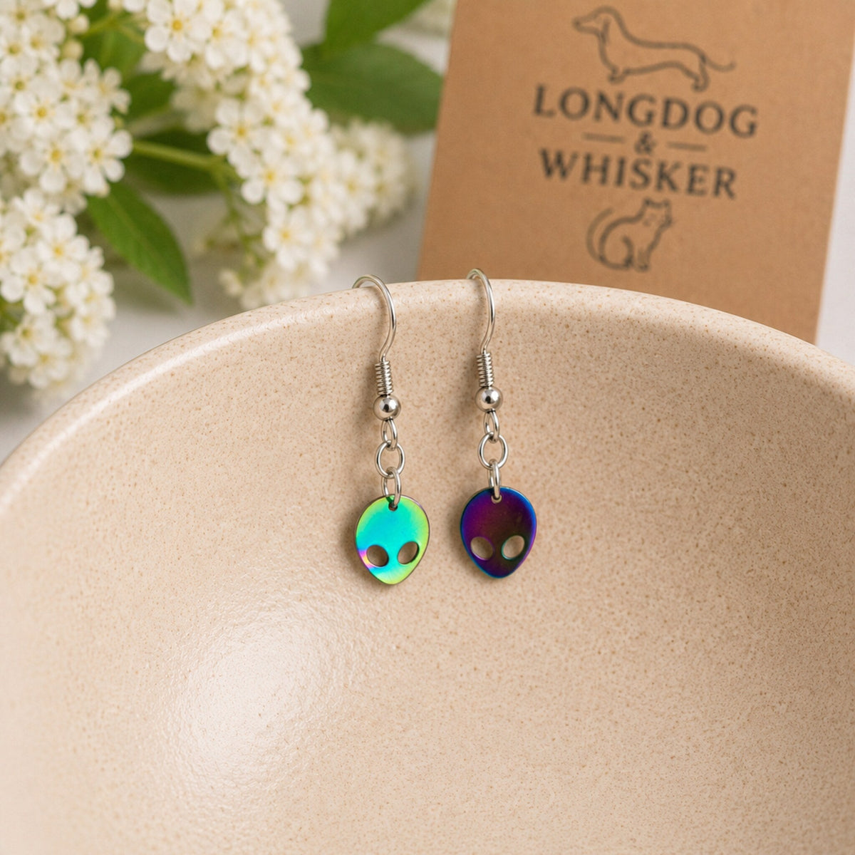 Alien Earrings displayed in a lifestyle product photo