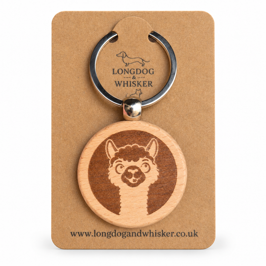Alpaca wooden keyring on its Longdog & Whisker kraft product card