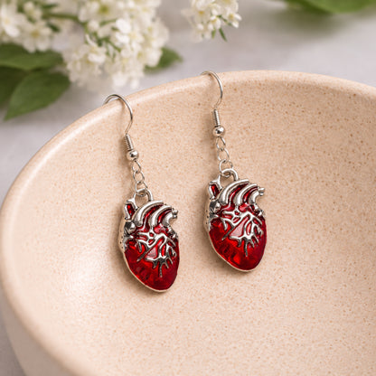 Anatomical Heart Earrings displayed in a lifestyle product photo