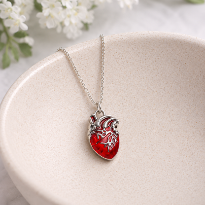 Anatomical Heart Necklace displayed in a lifestyle product photo