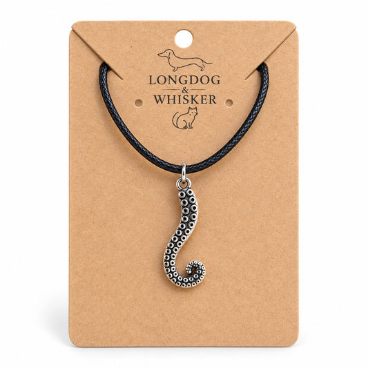 Antique silver tentacle black cord necklace on Longdog & Whisker card