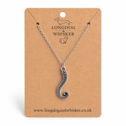 Antique silver tentacle necklace on a silver chain and Longdog & Whisker card