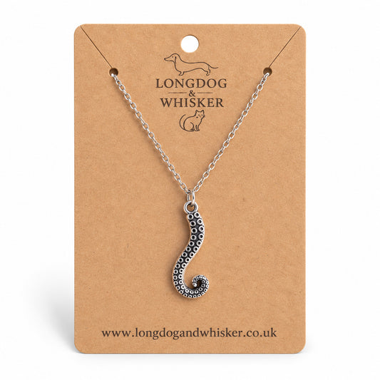 Antique silver tentacle necklace on a silver chain and Longdog & Whisker card