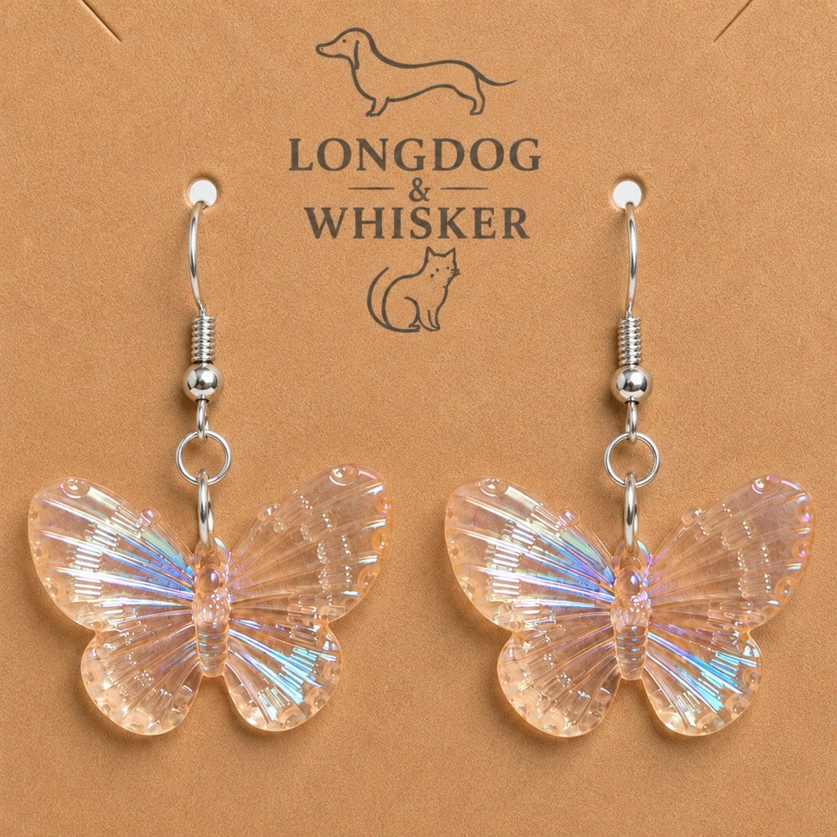 Close-up detail of Aurora Butterfly Earrings - Apricot with single connector rings