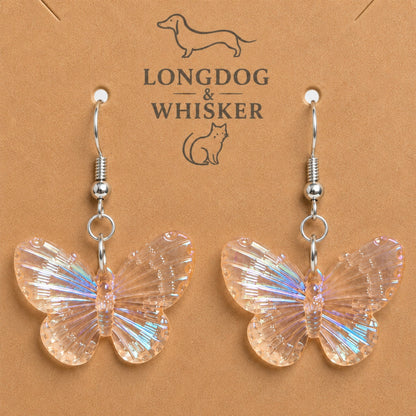 Close-up detail of Aurora Butterfly Earrings - Apricot with single connector rings
