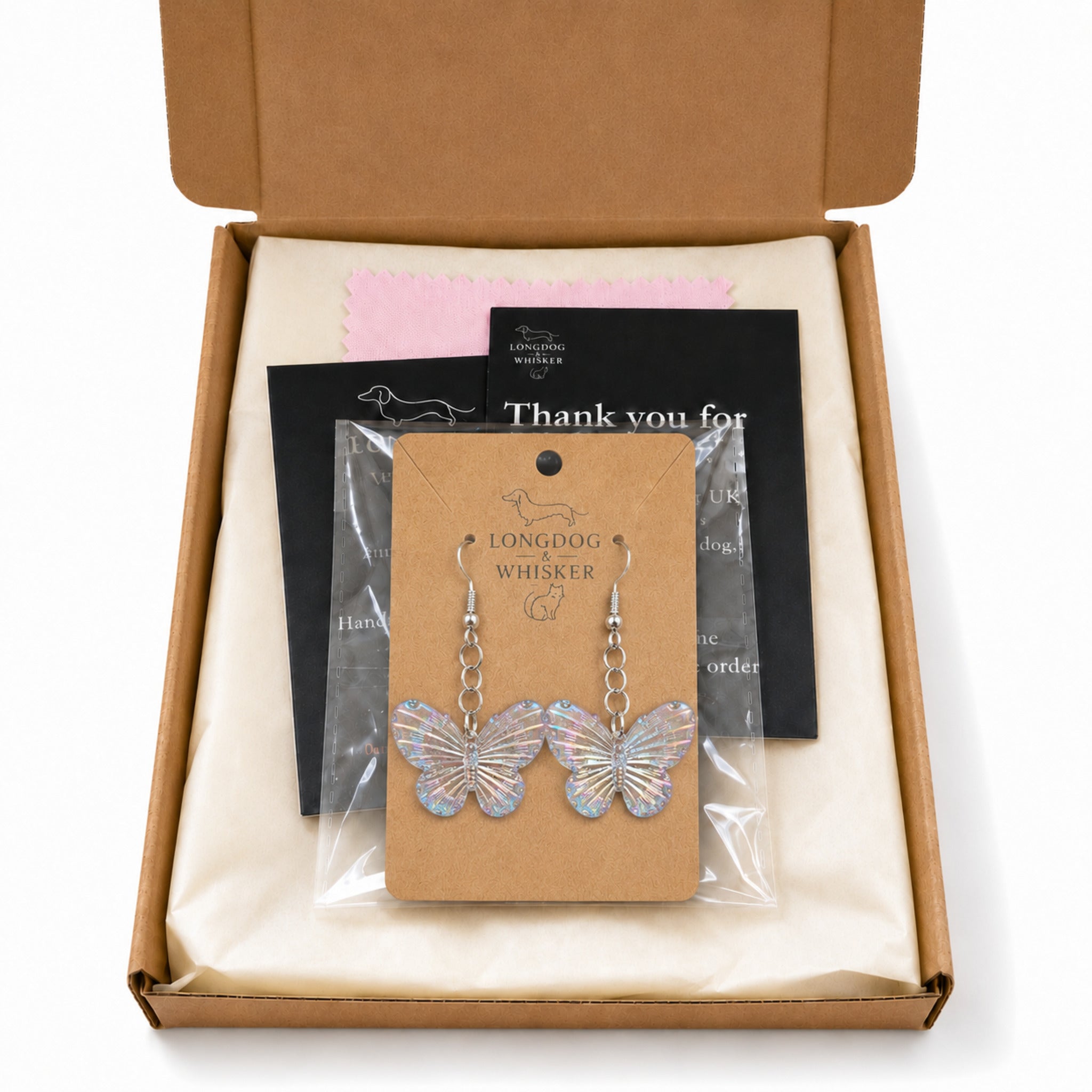 Aurora Butterfly Earrings in blue shown in Longdog and Whisker gift packaging