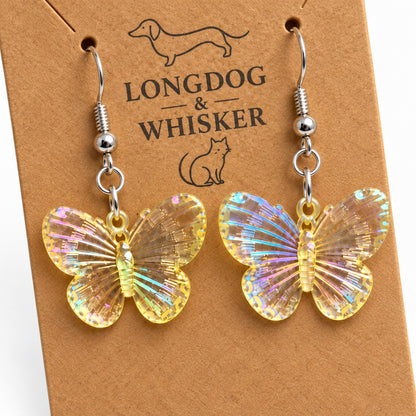 Close-up of Lemon Aurora Butterfly Earrings with iridescent wing detail