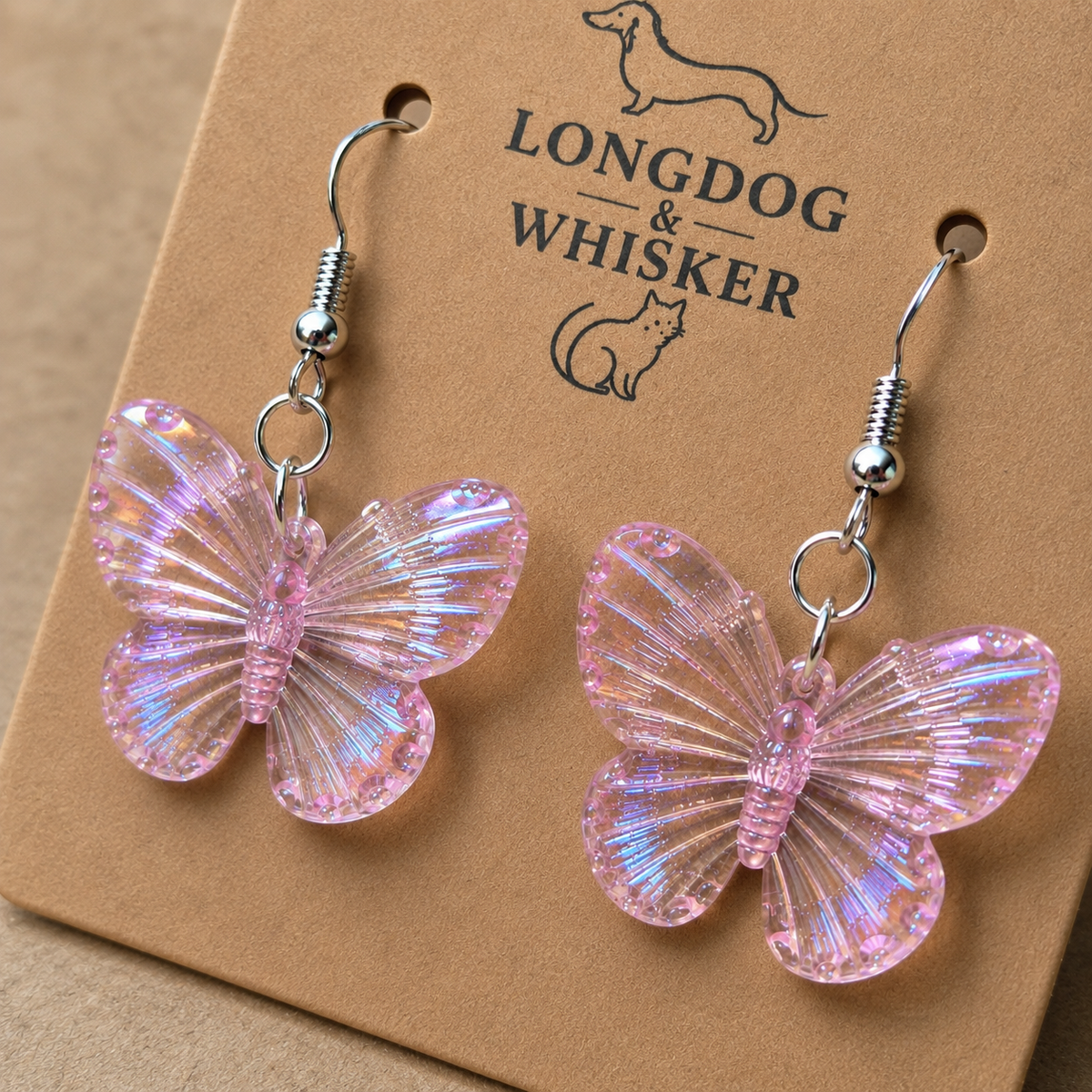 Close-up detail of Aurora Butterfly Earrings - Pink with single connector rings