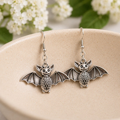 Smiley Bat Earrings displayed in a lifestyle product photo