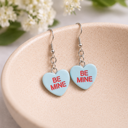Be Mine Heart Earrings - Light Blue displayed in a lifestyle product photo