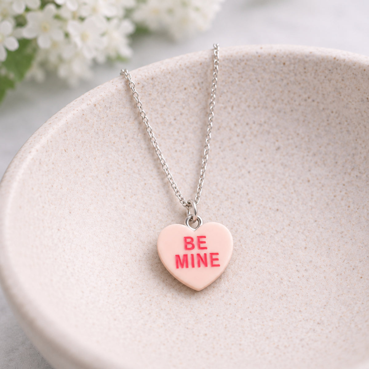 Be Mine Necklace - Peach displayed in a lifestyle product photo