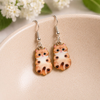 Belly Rub Cat Earrings - Tabby displayed in a lifestyle product photo