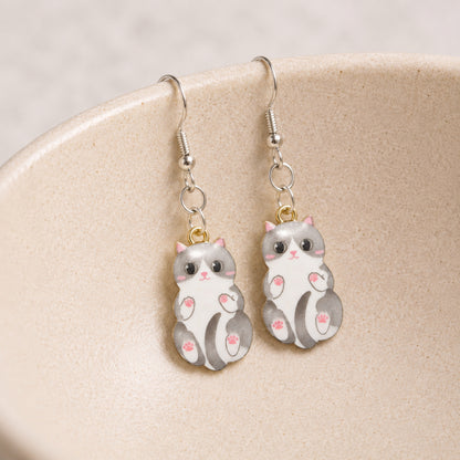Belly Rub Cat Earrings - Grey displayed in a lifestyle product photo