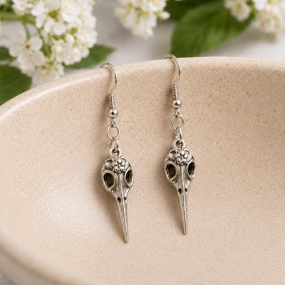 Bird Skull Earrings - Design 2 displayed in a lifestyle product photo