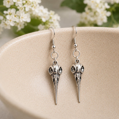 Bird Skull Earrings - Design 3 displayed in a lifestyle product photo