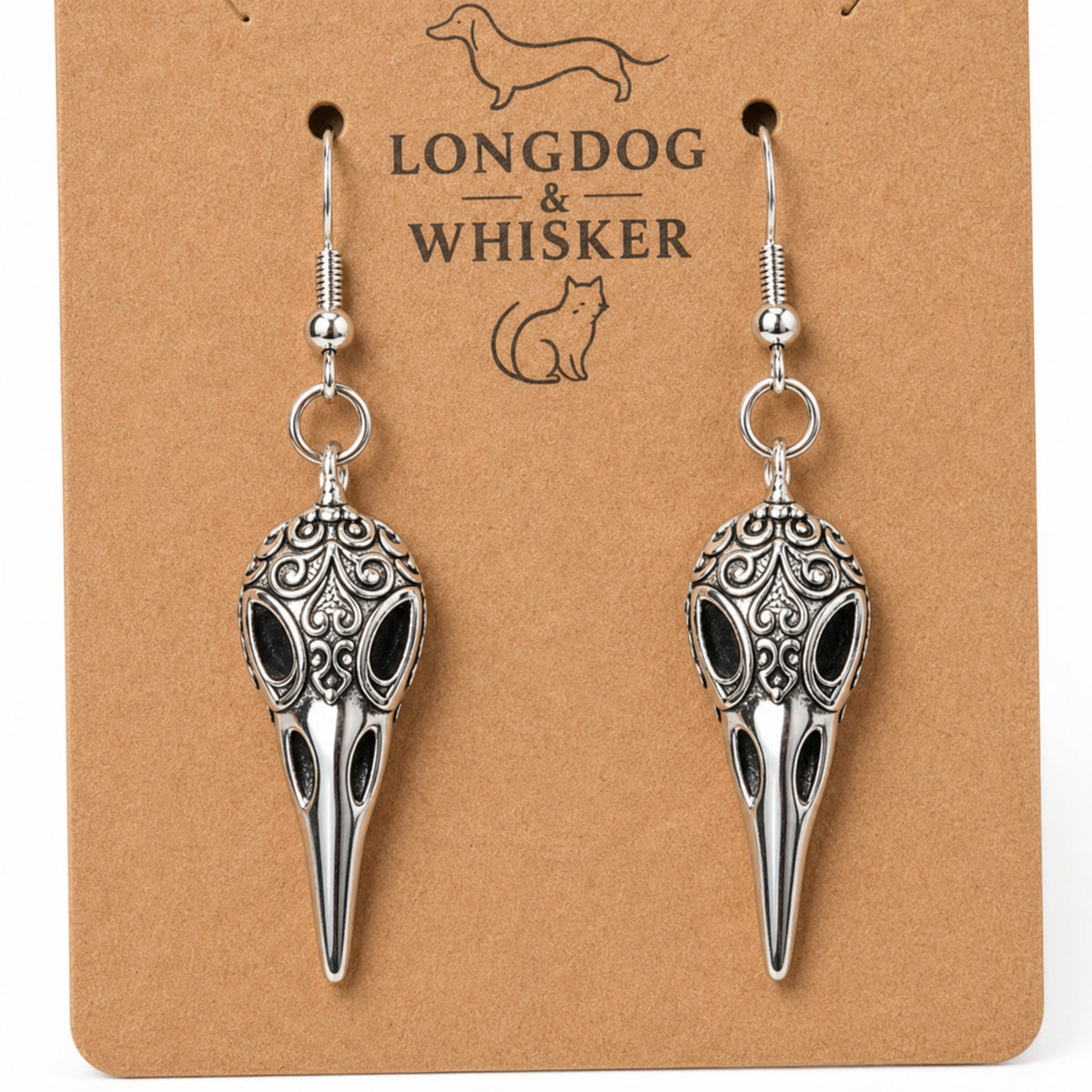 Close-up detail of Ornate Bird Skull Earrings