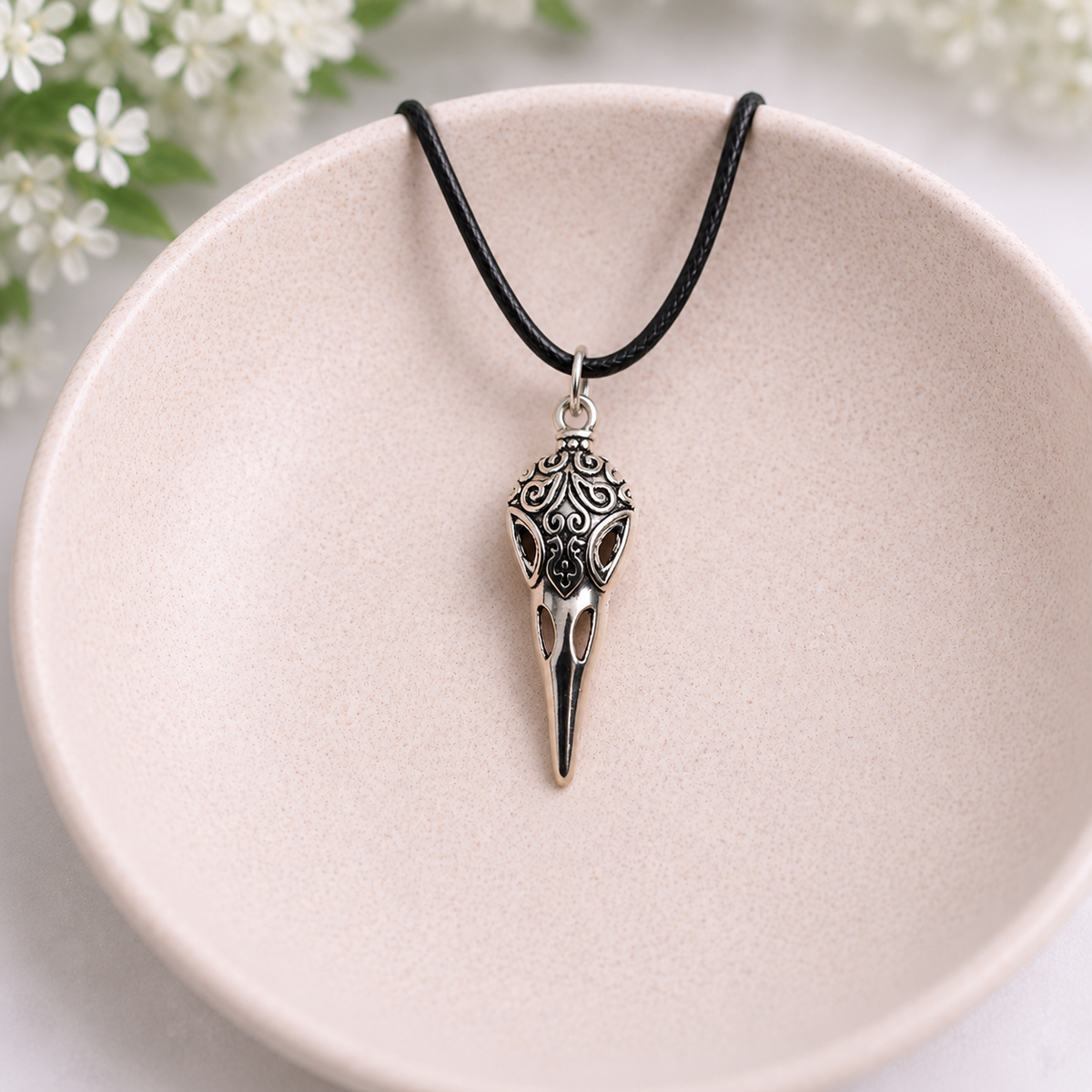 Bird Skull Design 5 Necklace displayed in a lifestyle product photo