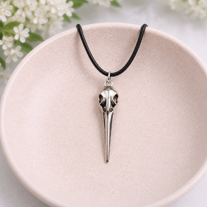 Classic Bird Skull Necklace displayed in a lifestyle product photo