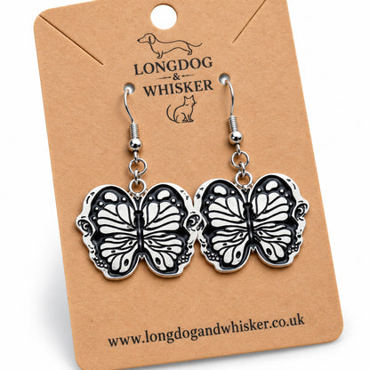 Close-up black butterfly drop earrings