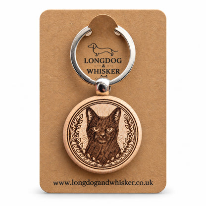 Black cat wooden keyring with a floral wreath on its Longdog & Whisker kraft card