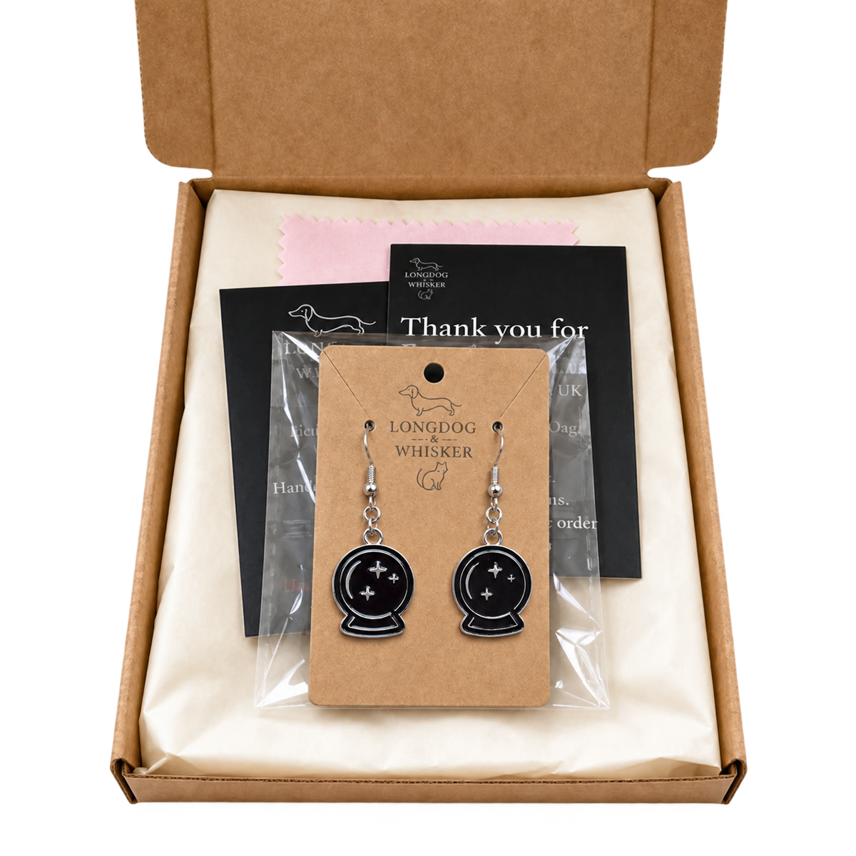 Black crystal ball drop earrings presented in Longdog & Whisker gift packaging