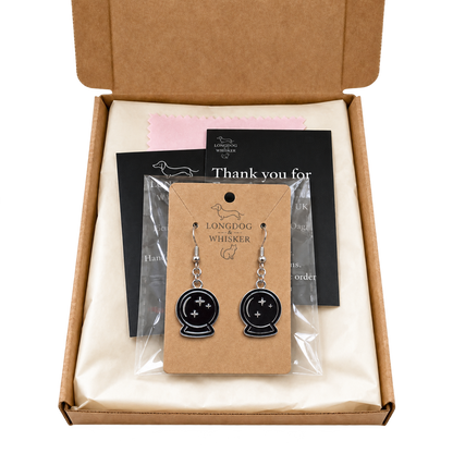 Black crystal ball drop earrings presented in Longdog & Whisker gift packaging