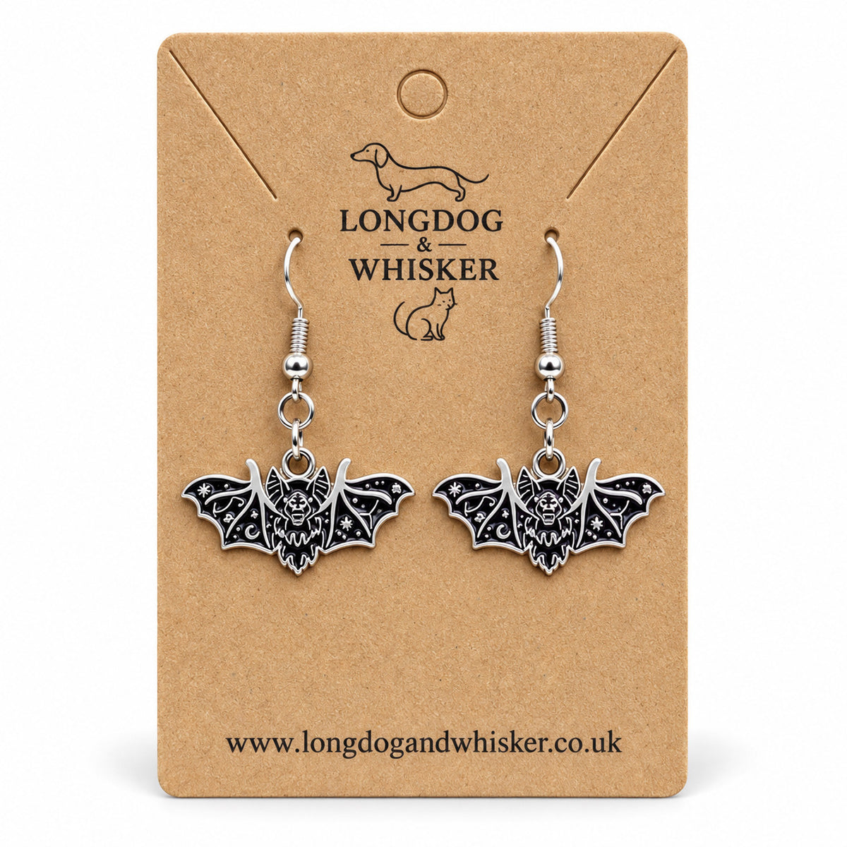 Black and silver fanged bat drop earrings on Longdog & Whisker kraft card