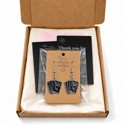 Black fortune teller card drop earrings presented in Longdog & Whisker gift packaging