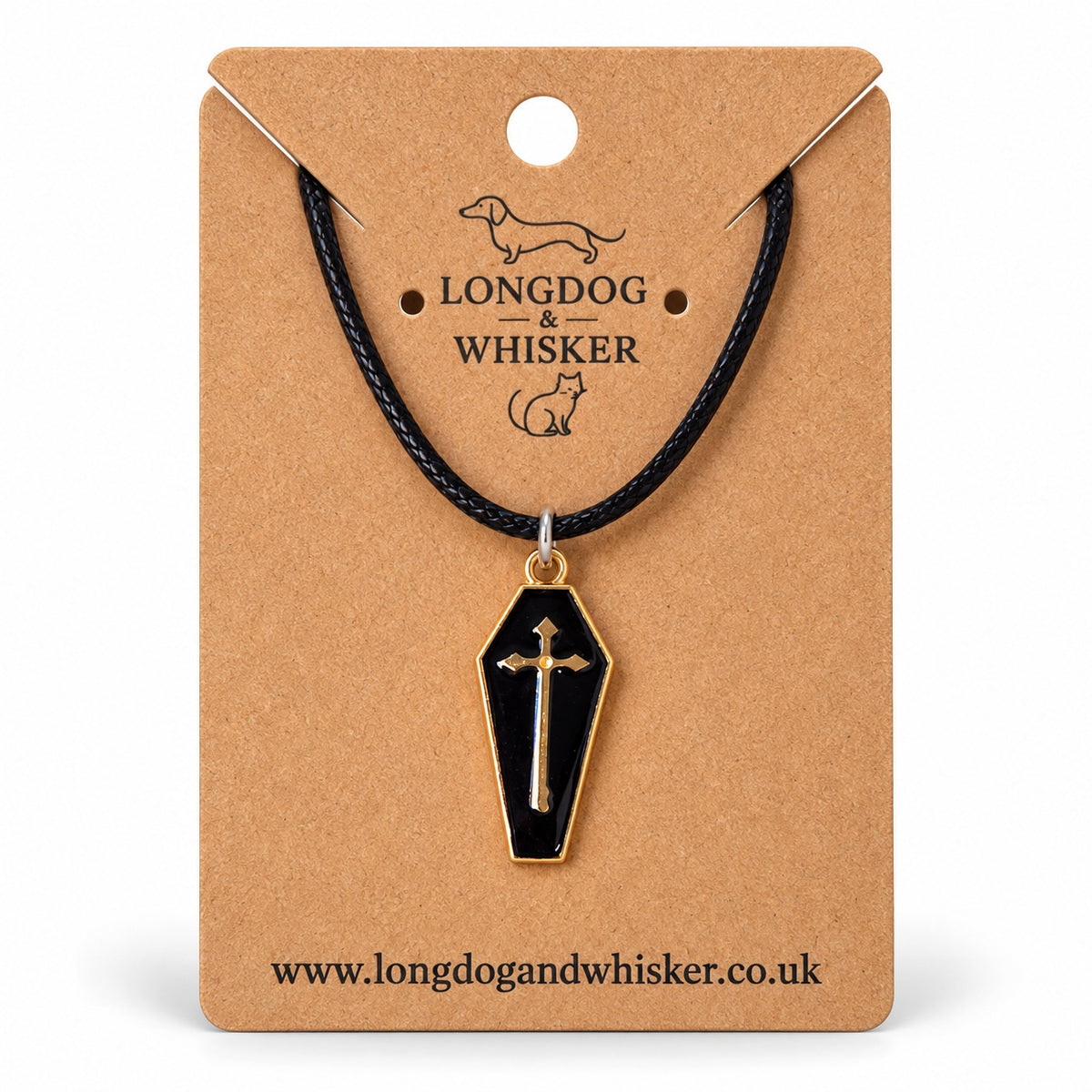 Black coffin necklace with gold-tone cross on black cord, displayed on a Longdog & Whisker kraft card