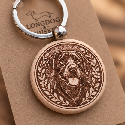 Close-up of the printed Black Labrador wooden keyring and silver-tone hardware