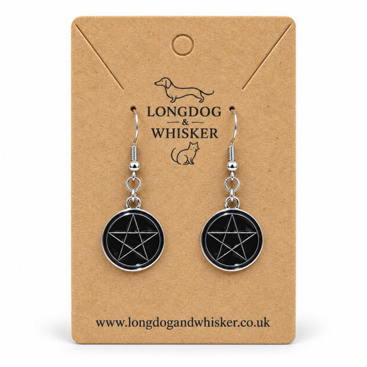 Black pentagram drop earrings displayed on a Longdog & Whisker kraft product card